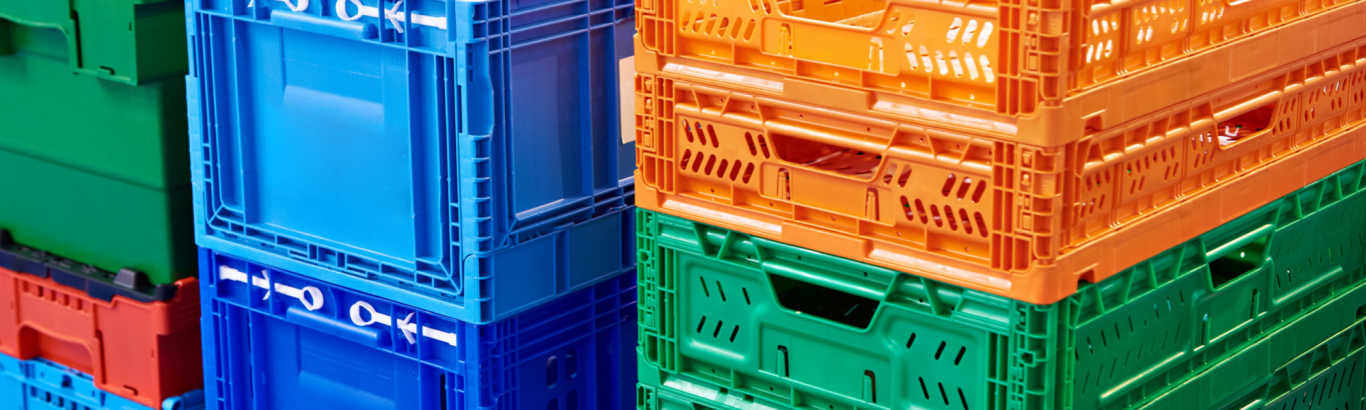 Stacked folding crates in various colours